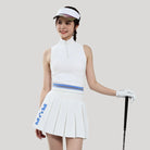 Woman in golf attire with a white outfit and blue accents, holding a golf club.